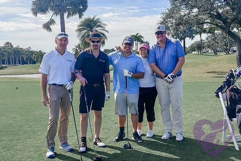 Shot of people on a golf course